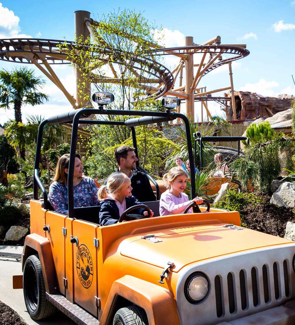 Family enjoying the Dino Tour Company jeep ride in Lost Kingdom at Paultons Park