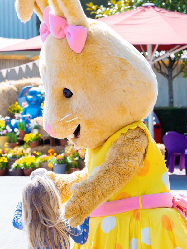 Easter Bunny meeting a young guest during Easter event at Paultons Park