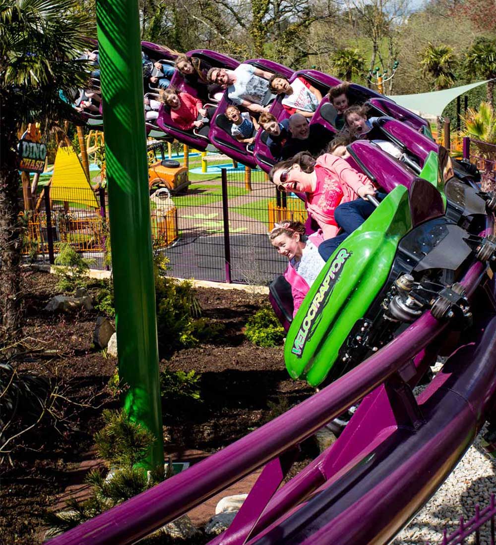 Guests riding the Velociraptor roller coaster in Lost Kingdom at Paultons Park