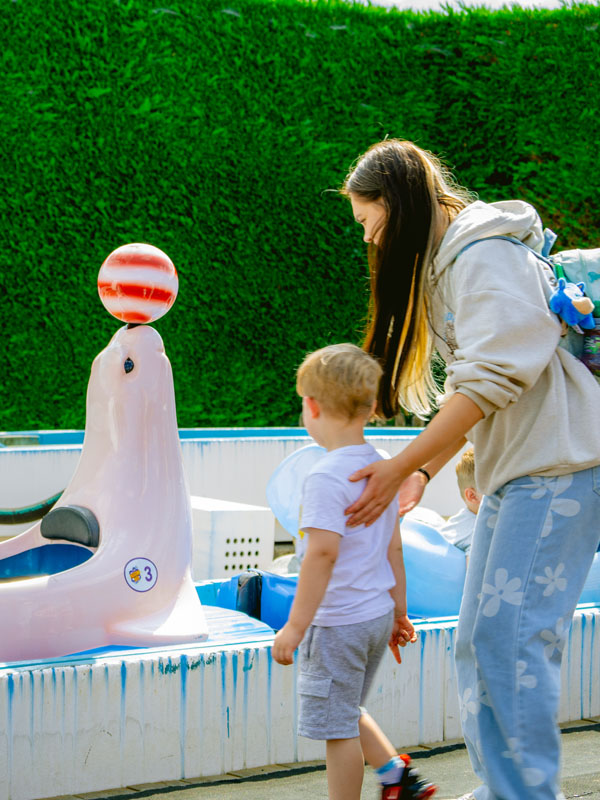 Family approaching Seal Falls ride vehicle at Paultons Park