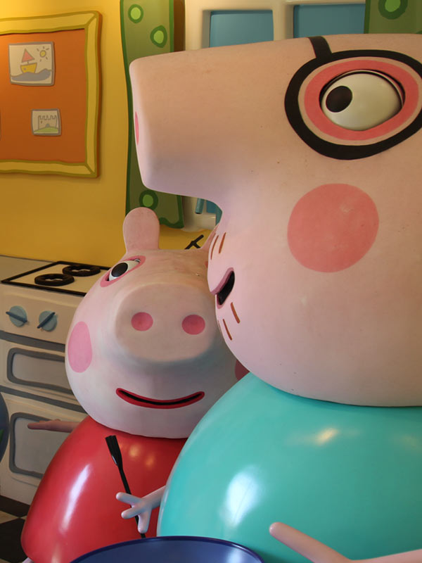 Peppa and Daddy Pig inside Peppa Pig’s House kitchen in Peppa Pig World at Paultons Park