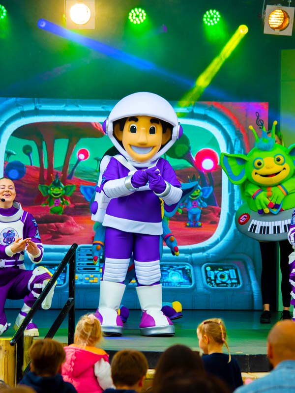 Astronaut character performing on stage during the Blast Off Summer Show at Paultons Park