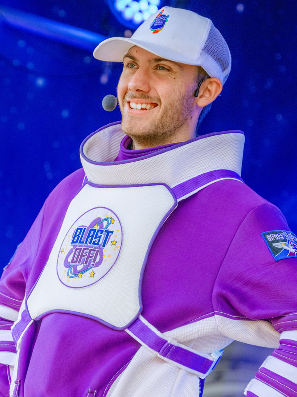 Full cast performing on stage during the Blast Off Summer Show at Paultons Park