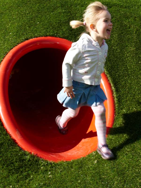 Colourful playground equipment and hot air balloon ride at Mr Potato's Playground in Peppa Pig World at Paultons Park