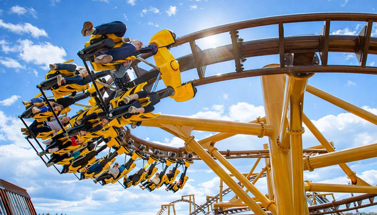 Guests riding a thrilling rollercoaster during a Club Paultons event at Paultons Park