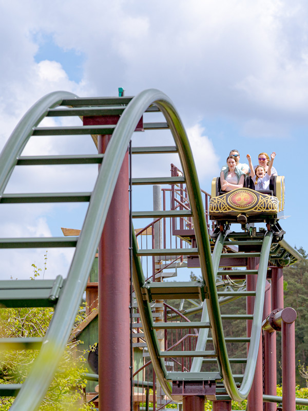 Family riders on the Raven coaster track in Valgard at Paultons Park.