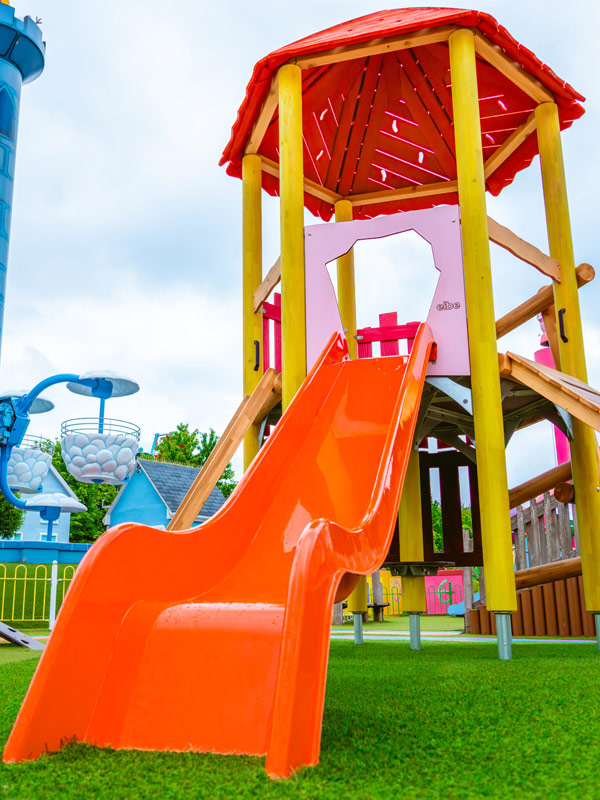 Colourful playground equipment and hot air balloon ride at Mr Potato's Playground in Peppa Pig World at Paultons Park