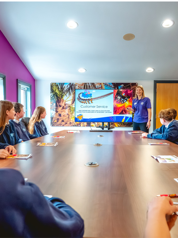 Paultons Park school workshop with pupils learning about customer service in a classroom session