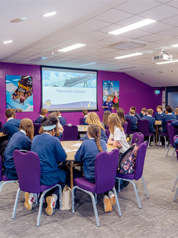 Paultons Park school workshop with pupils learning about theme park statistics in a classroom session