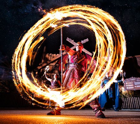 ParkPerformer creating a ring of fire during the Halloween show in Valgard