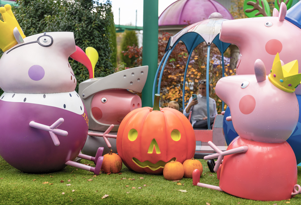 Peppa Pig World at Halloween with a pumpkin decoration beside Grampy Rabbit's Sailing Club