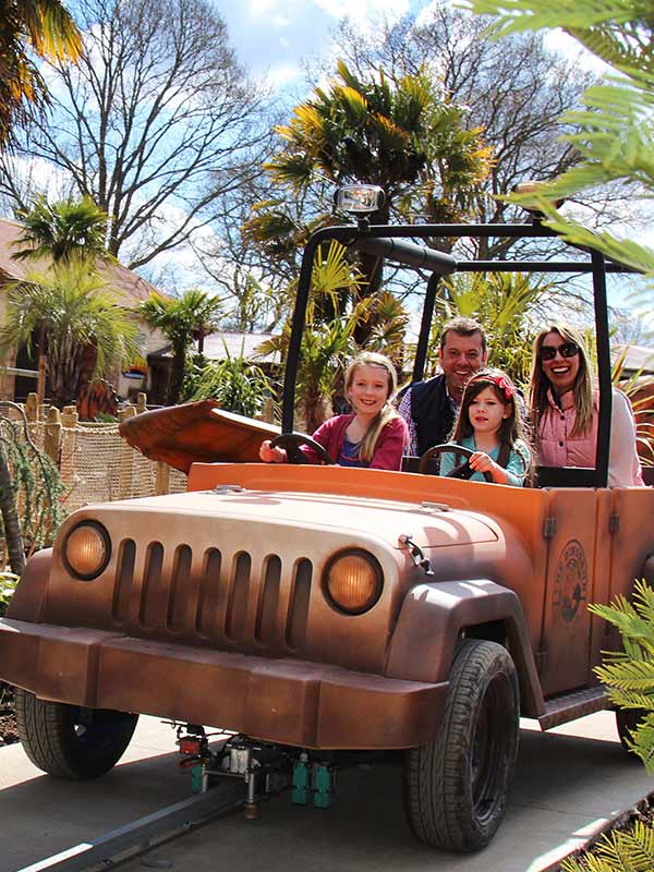 Family enjoying Dino Tour Co in Lost Kingdom at Paultons Park during the Free Teacher Takeover Event